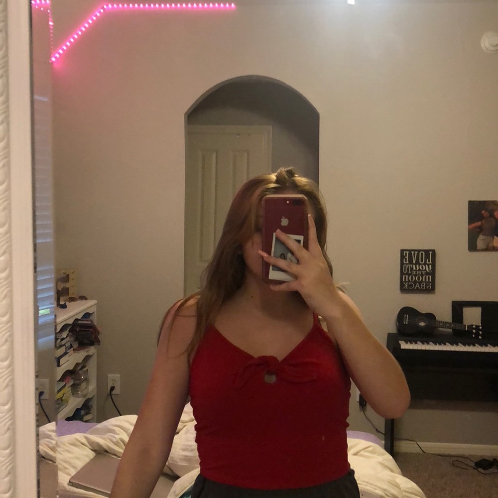 Red tank top with tie in middle